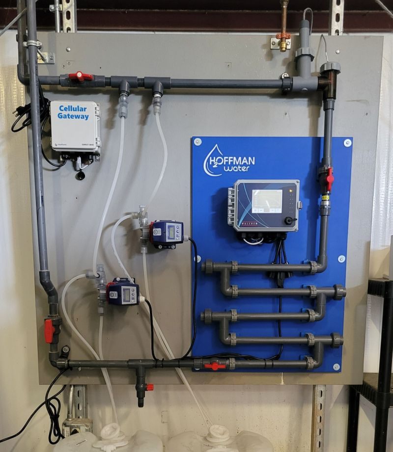 Hoffman Water-branded closed-loop control panel with Walchem controller and metering pumps